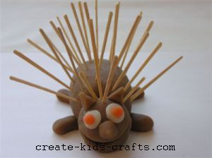 Hedgehog made with playdough and toothpicks.