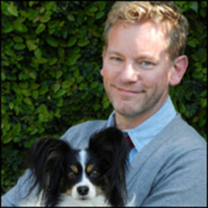 Portrait of illustrator and author KG Campbell and his dog